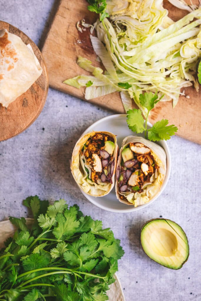 Vegan breakfast wrap with beans and tofu